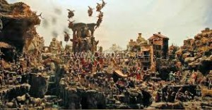 Nel presepe Cuciniello un volo d'angeli si leva dalla Sacra famiglia, allestita quasi all'aperto.Ma inaltre parti il presepe riproduce scene di vitacomunedell'800...