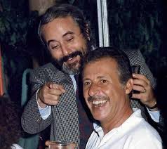 Falcone e Borsellino, Giovanni e Paoloscherazano amabilmente.Si sache accantoaloro ci fosse nell'attimodell'ustantaneaanche caponnetto.