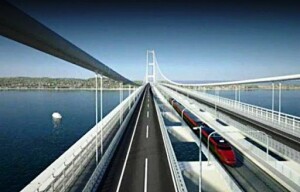 Il Ponte sullo Stretto è un completamnto del Corridoio N. Uno del programma Ue di messa in rete di trasporti europei (Berlino - Palermo) e mettrebb ilgrande portio naturakle di Aufìgusta di divnire - com merita - la 'Porta d'Europa?. EHa un fondale di 16 mt per uno spazio pari ametà del Golfo di Palermo. E' il massimo porto naturale dl continente europeo. Ma è isolato a causa dello Stretto. Messina, Reggio e Villa divrrebbero una una funzionale area metropolitana con servizi comuni.